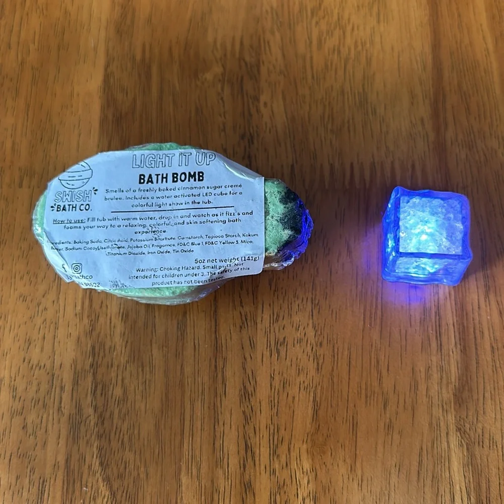 Bath bomb. Christmas bulb design with Christmas cookie smell. Lights up